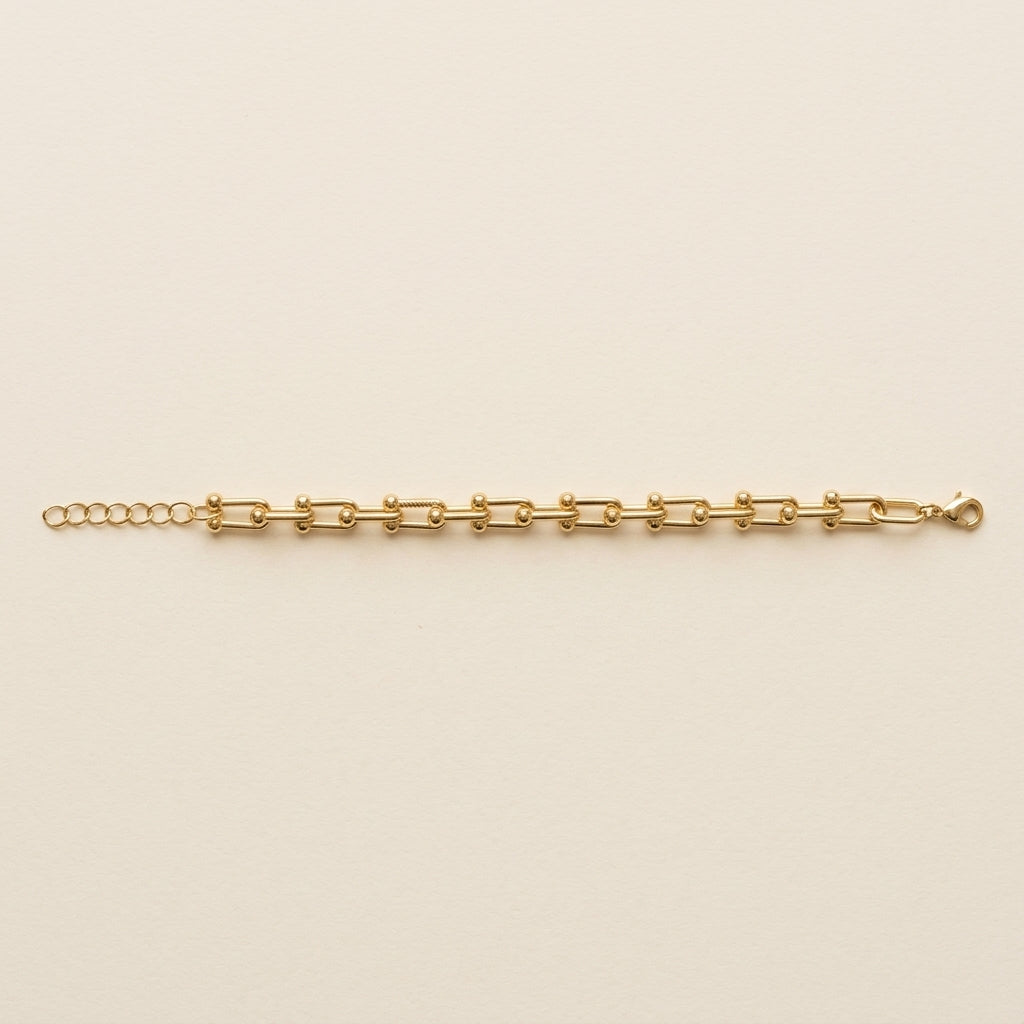 PULSERA RIVET ESLABON RECTANGULAR DORADO