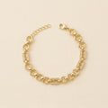 PULSERA ESLABONES CIRCULARES CON DETALLES DE GRECA GRIEGA Y CIRCONES PAVE
