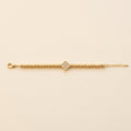 PULSERA DE ESFERAS DORADAS CON TREBOL CENTRAL Y CIRCONES PAVE