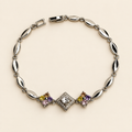 PULSERA PLATEADA MARQUISE CON DETALLE CENTRAL DE CRISTALES Y FLORES MULTICOLOR
